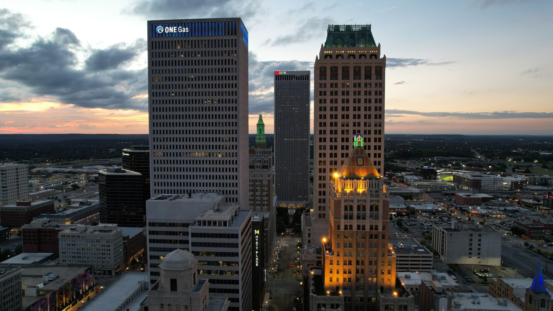 Tulsa Oklahoma downtown skyline at twilight — ONEOK Building and historic architecture vis