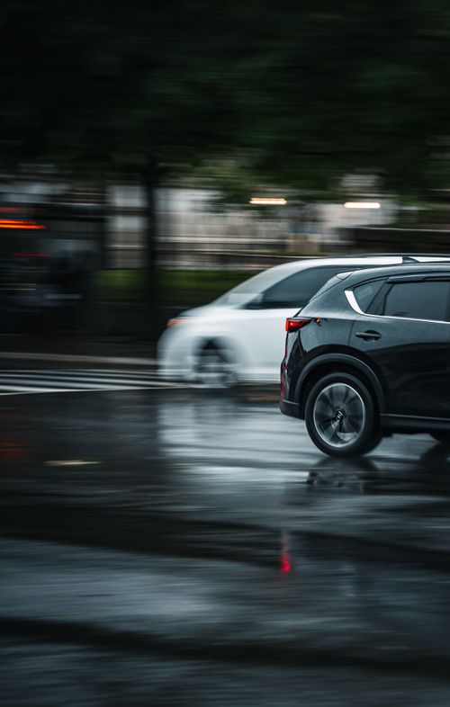 Free Dramatic motion blur captures cars speeding on a rainy day in Washington DC. Stock Photo