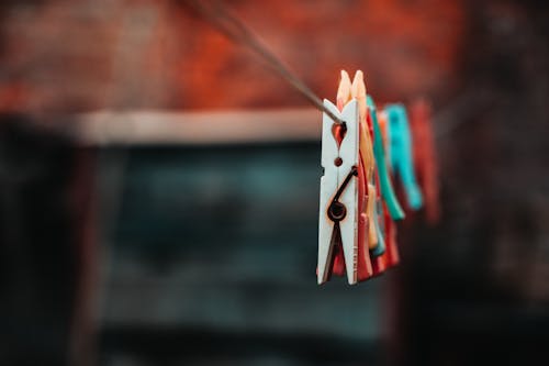Free Clothes Pegs on Clothesline Stock Photo