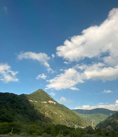 Free Stunning view of lush green mountains under a bright blue sky in Turkey. Stock Photo