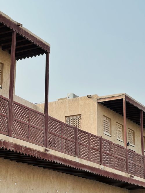 Free Close-up of traditional architecture featuring wooden beams and latticework. Stock Photo