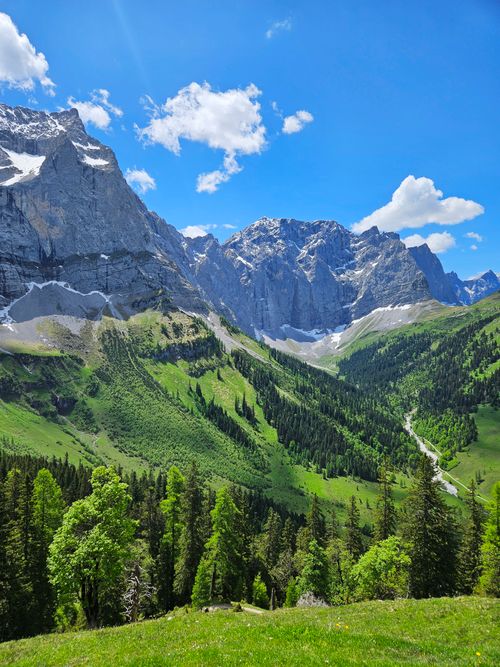 Free Stunning landscape of the lush Karwendel Alps in Austria under a clear blue sky. Stock Photo
