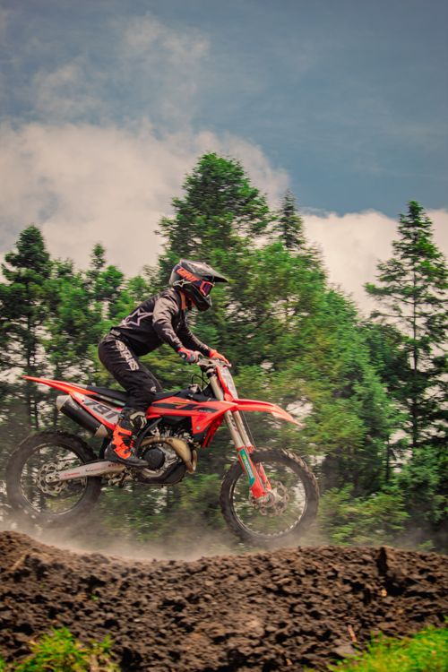 Free Exciting motocross action in lush forest landscape captured at La Marquesa, Mexico. Stock Photo
