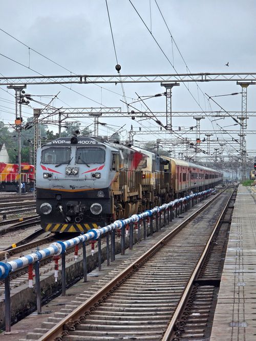 Free Electric locomotive at Ambala Cantt railway station in India, showcasing intricate rail network. Stock Photo