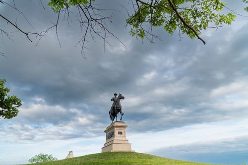 Free A majestic war memorial statue under a dramatic sky at Gettysburg, Pennsylvania. Stock Photo