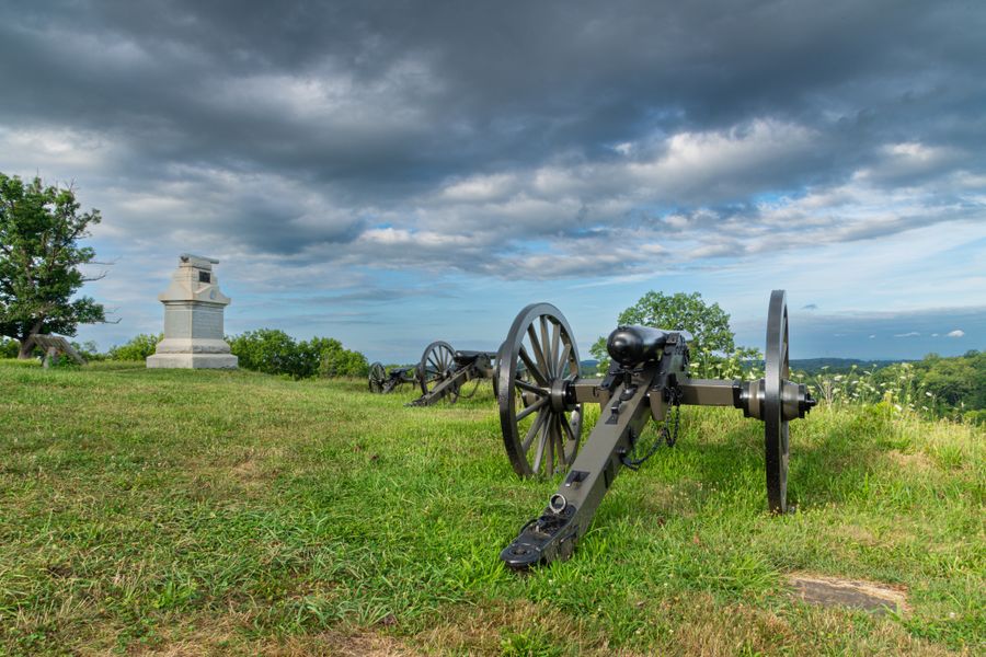 Historic cannons and a monument on a Civil War battlefield