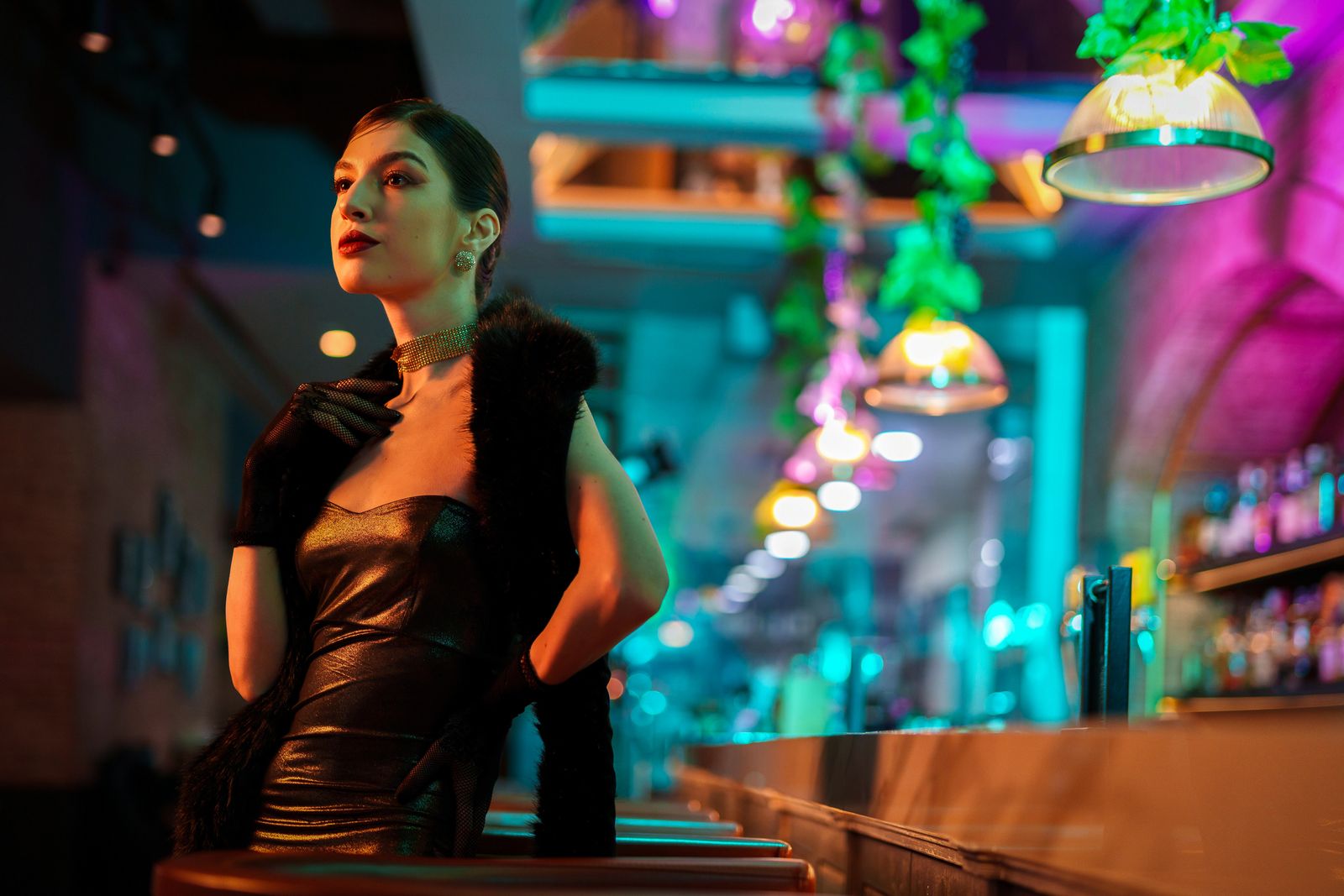 night out fashion 2026 stylish woman in evening dress at bar