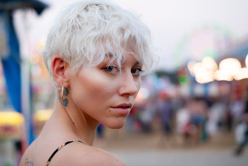 Woman with White Hair Wearing Loop Earing