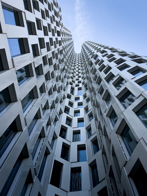 Free Abstract view of a modern skyscraper in Berlin, featuring unique architectural design and structure. Stock Photo