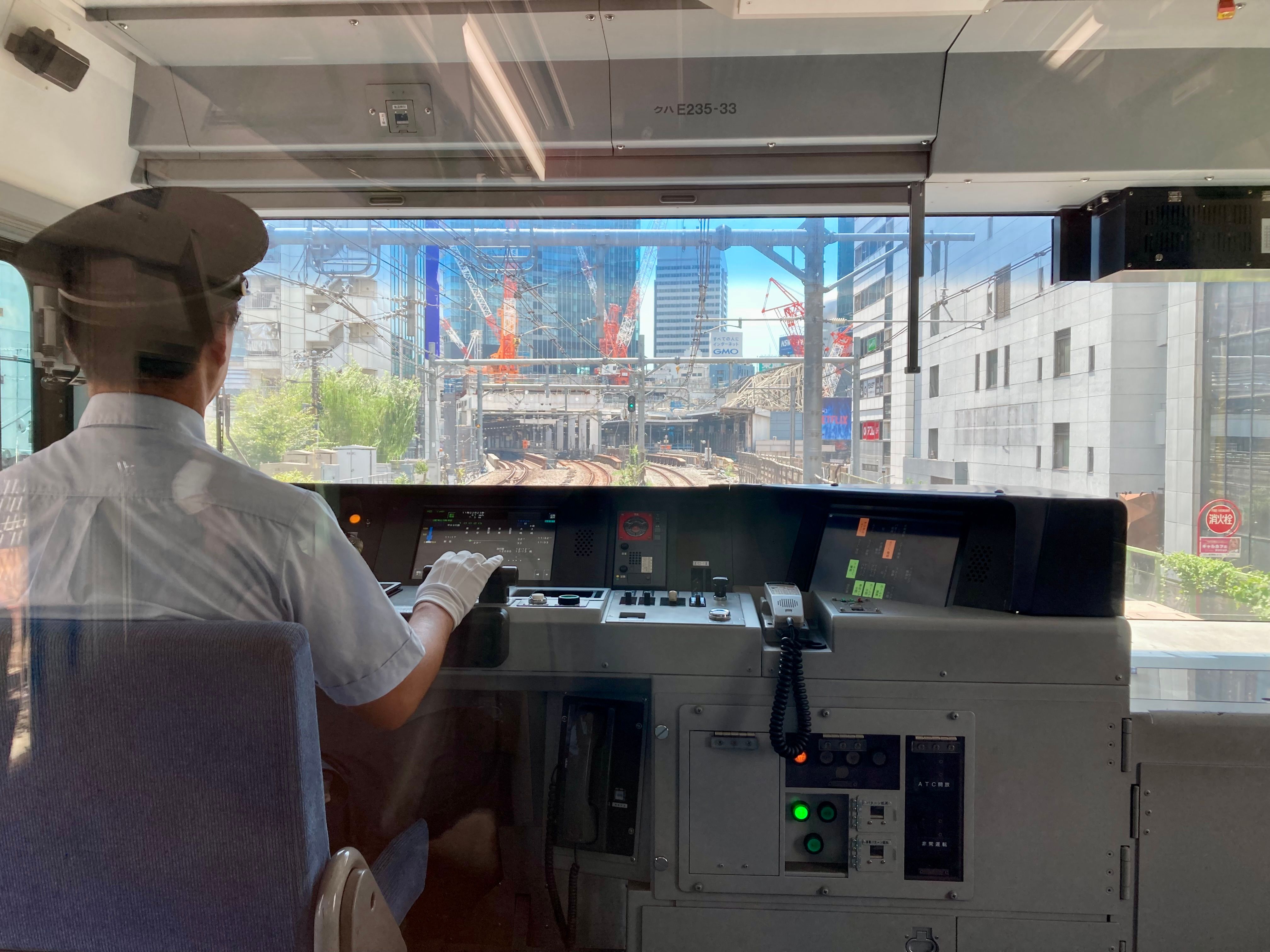 Tokyo Train Operator at Shibuya Station · Free Stock Photo