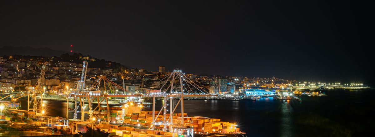 A stunning night view of the illuminated port and cityscape of Vigo, Spain.