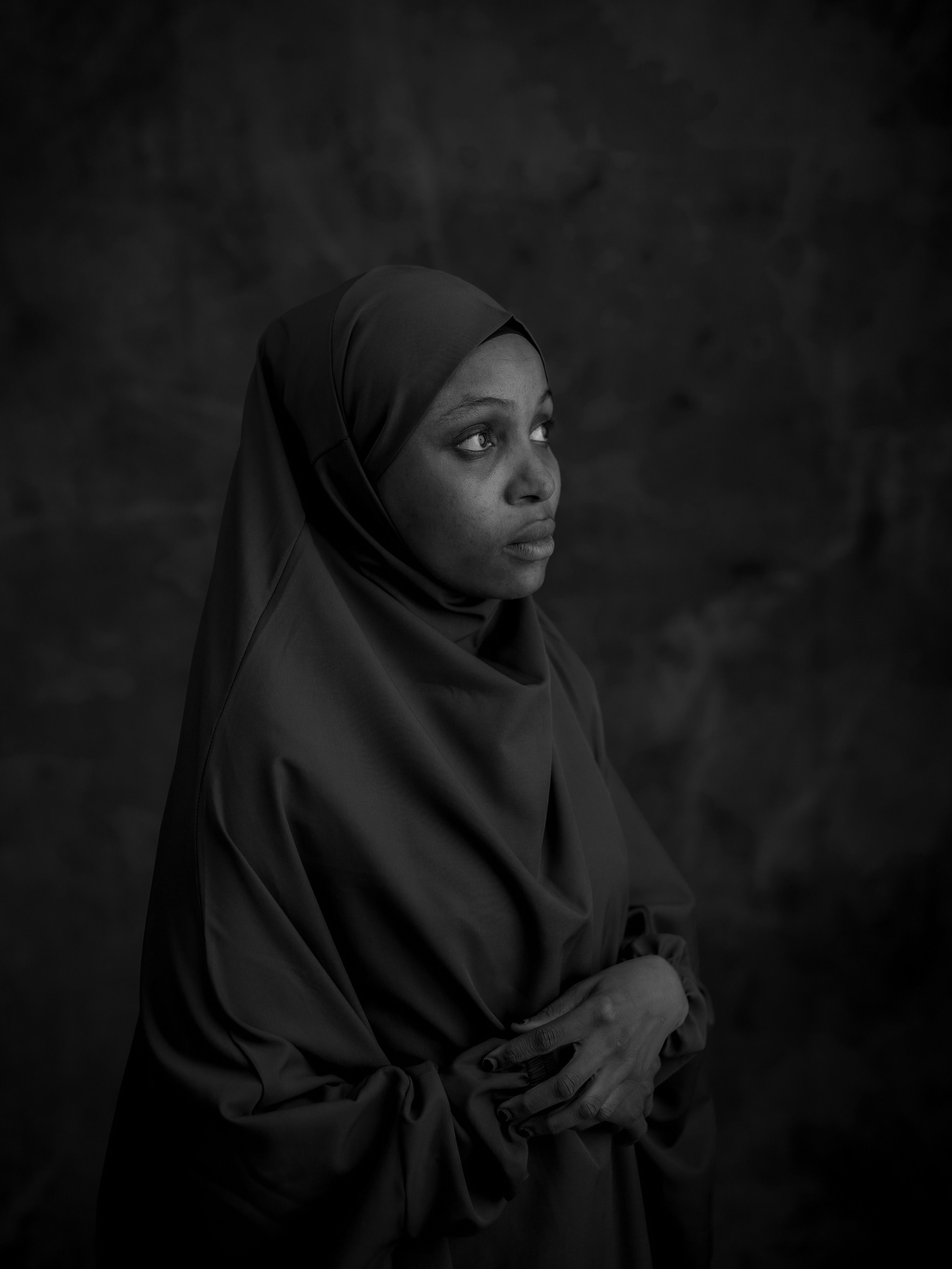 Black and White Portrait of Woman in Traditional Dress · Free Stock Photo