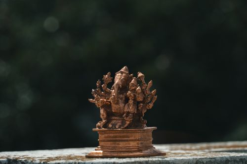 Free Close-up of an intricate brass Ganesha statue showcasing traditional artistry in Bengaluru. Stock Photo