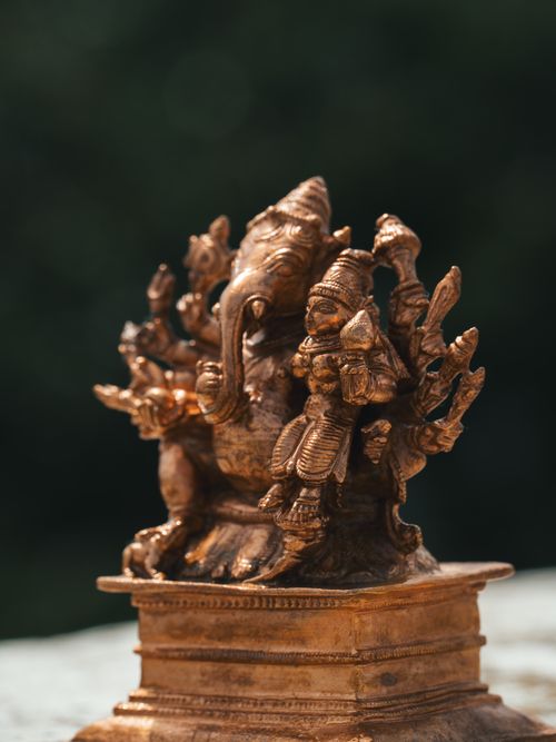 Free Close-up shot of a handcrafted brass statue depicting Hindu deity Ganesha, symbolizing wisdom and new beginnings. Stock Photo