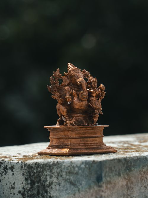 Free Detailed bronze statue of Hindu deity on a pedestal in Bangalore, India, showcasing traditional craftsmanship. Stock Photo