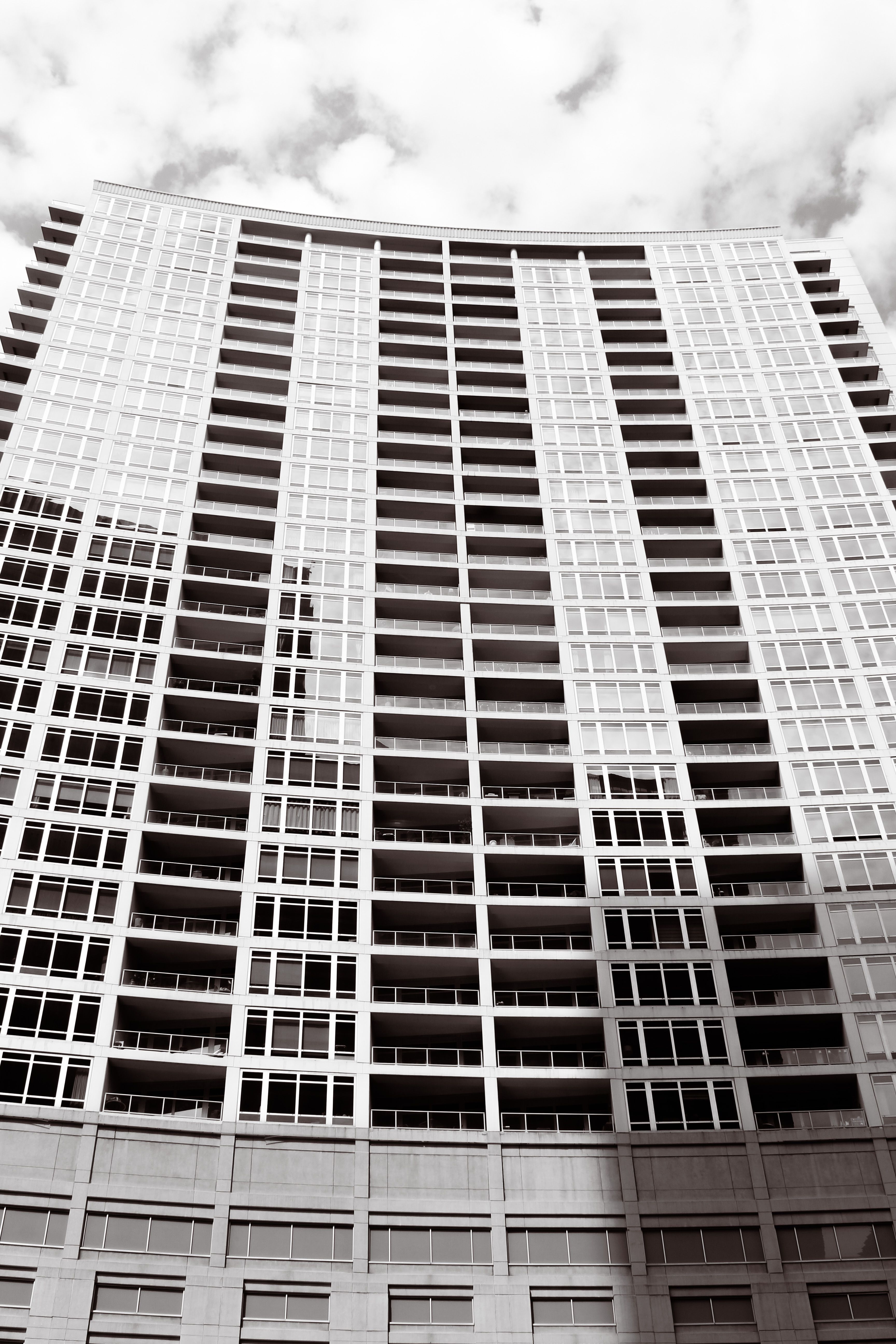 Black and White Exterior of a Modern Skyscraper · Free Stock Photo