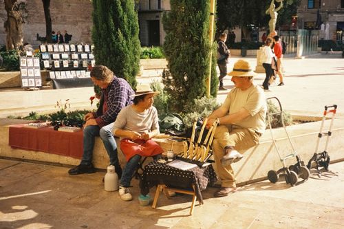Free A lively daytime street market in Valence, Spain, showcasing local merchants and crafts. Stock Photo