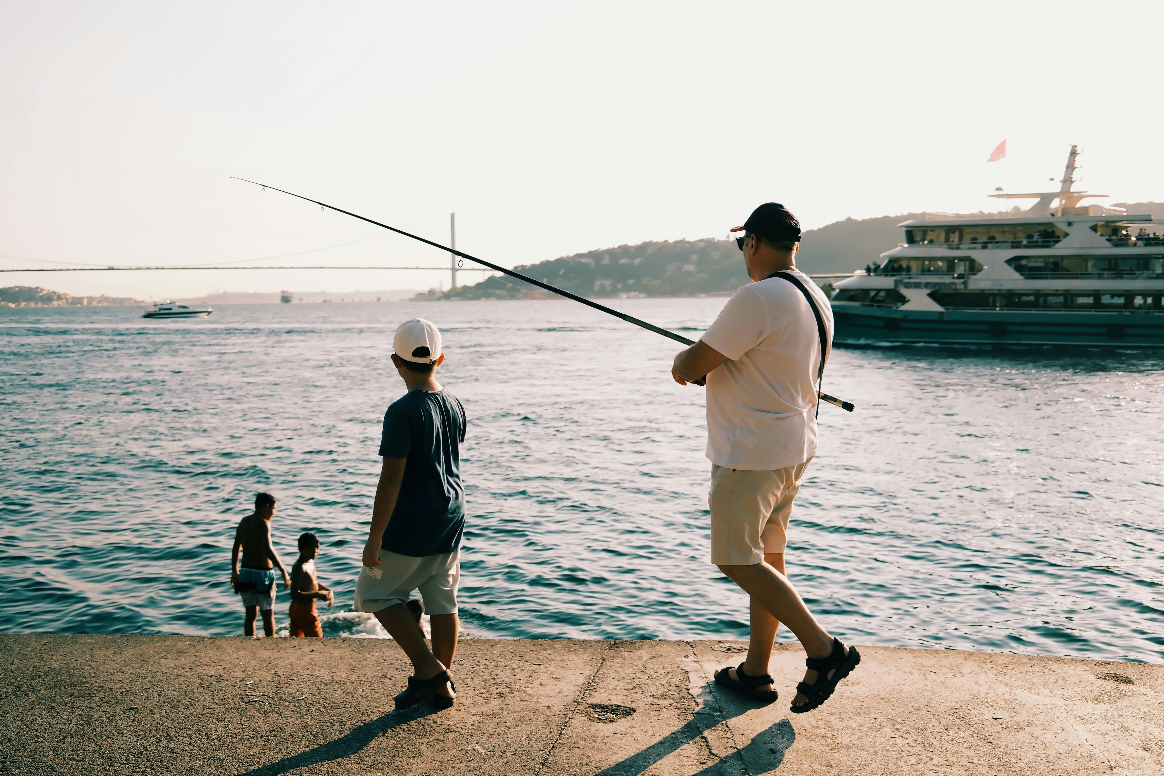 Relaxing summer day fishing by the Bosphorus with family.