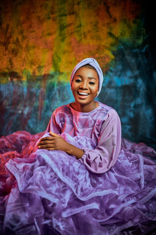 Free Portrait of a joyful woman in colorful traditional clothing, showcasing cultural beauty. Stock Photo