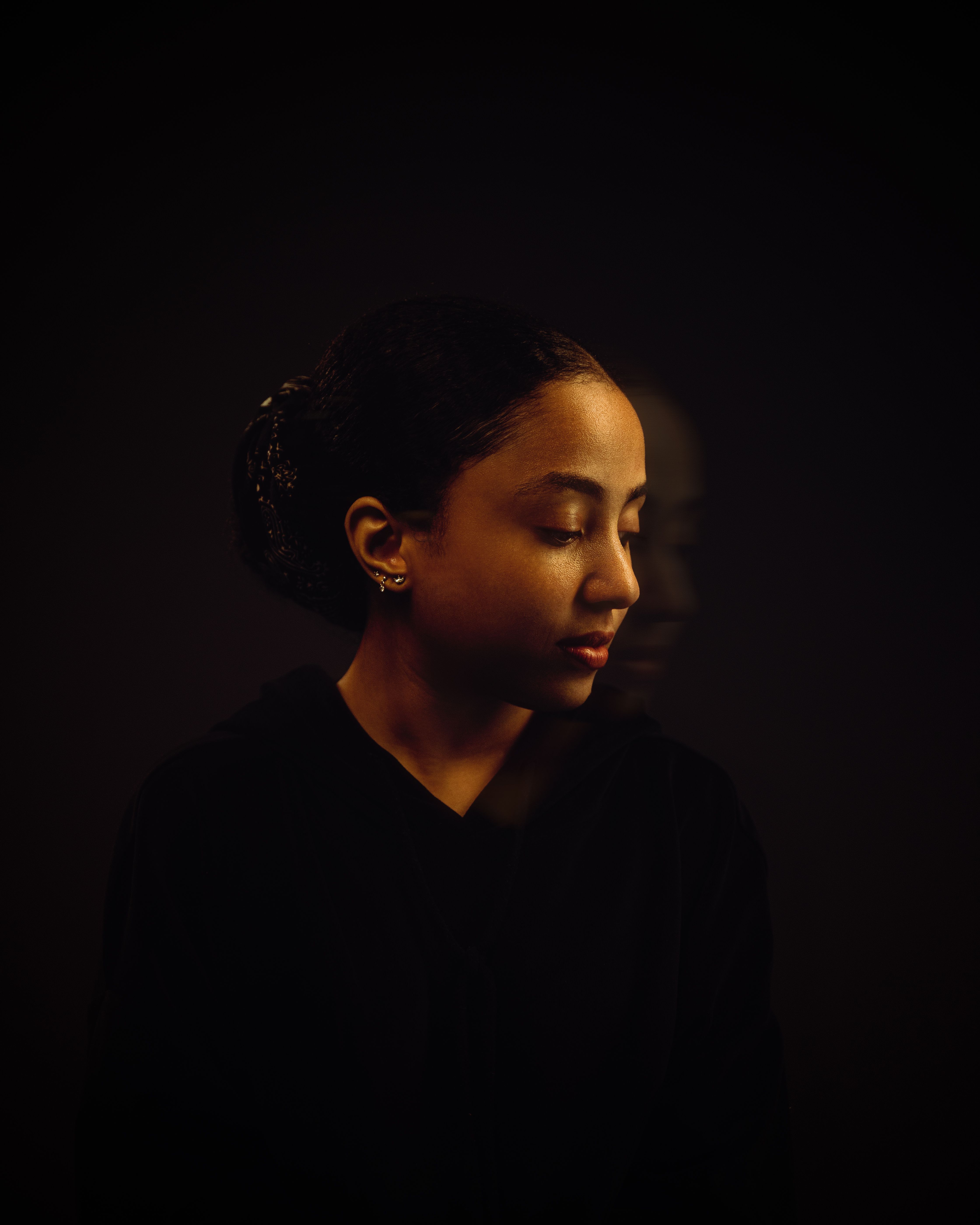 Woman Portrait in Darkness · Free Stock Photo