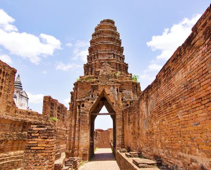 Explore the ancient brick ruins of Ayutthaya, a stunning historical site in Thailand.