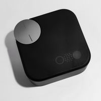 Compact black power bank on a pale surface — photo by Puru Raj on Pexels
