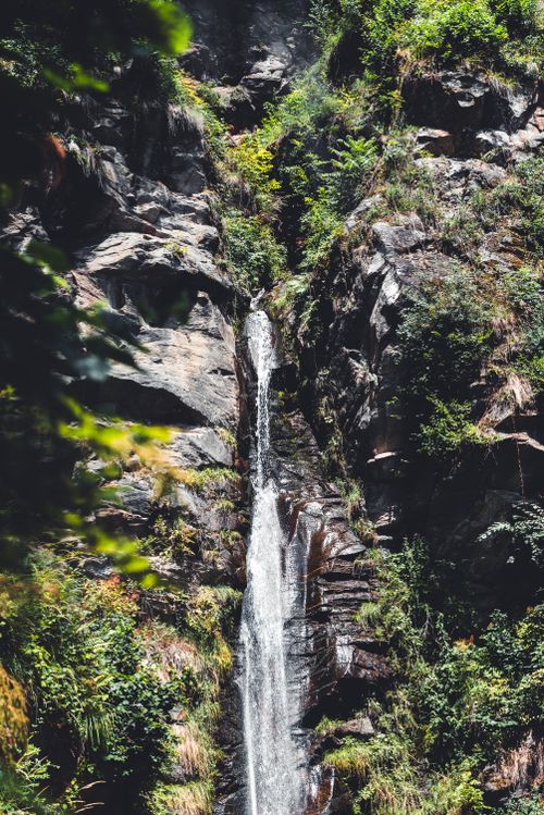 Free Majestic waterfall surrounded by lush greenery in Villach, Carinthia, Austria Stock Photo
