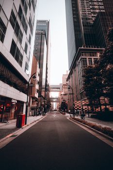 Explore the vibrant architecture and urban life of Nihombashi, a key district in Tokyo, Japan.