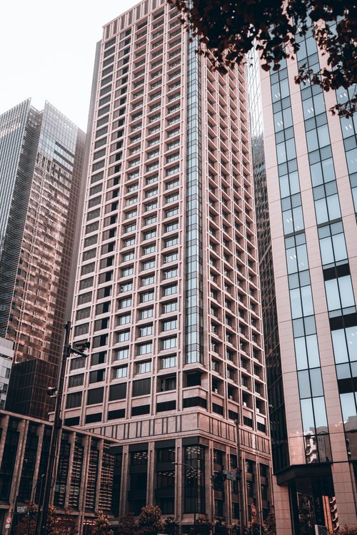 Free Tall modern skyscraper in Nihombashi area of Tokyo, highlighting the city's urban architectural style. Stock Photo