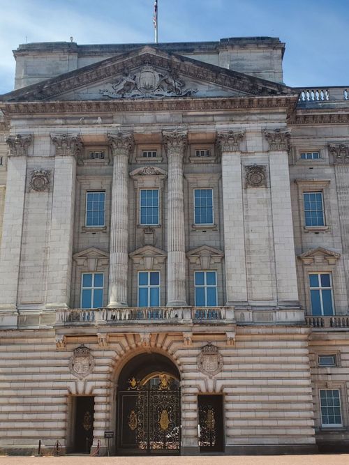 Free Explore the historic facade of Buckingham Palace, a symbol of British royalty in London. Stock Photo