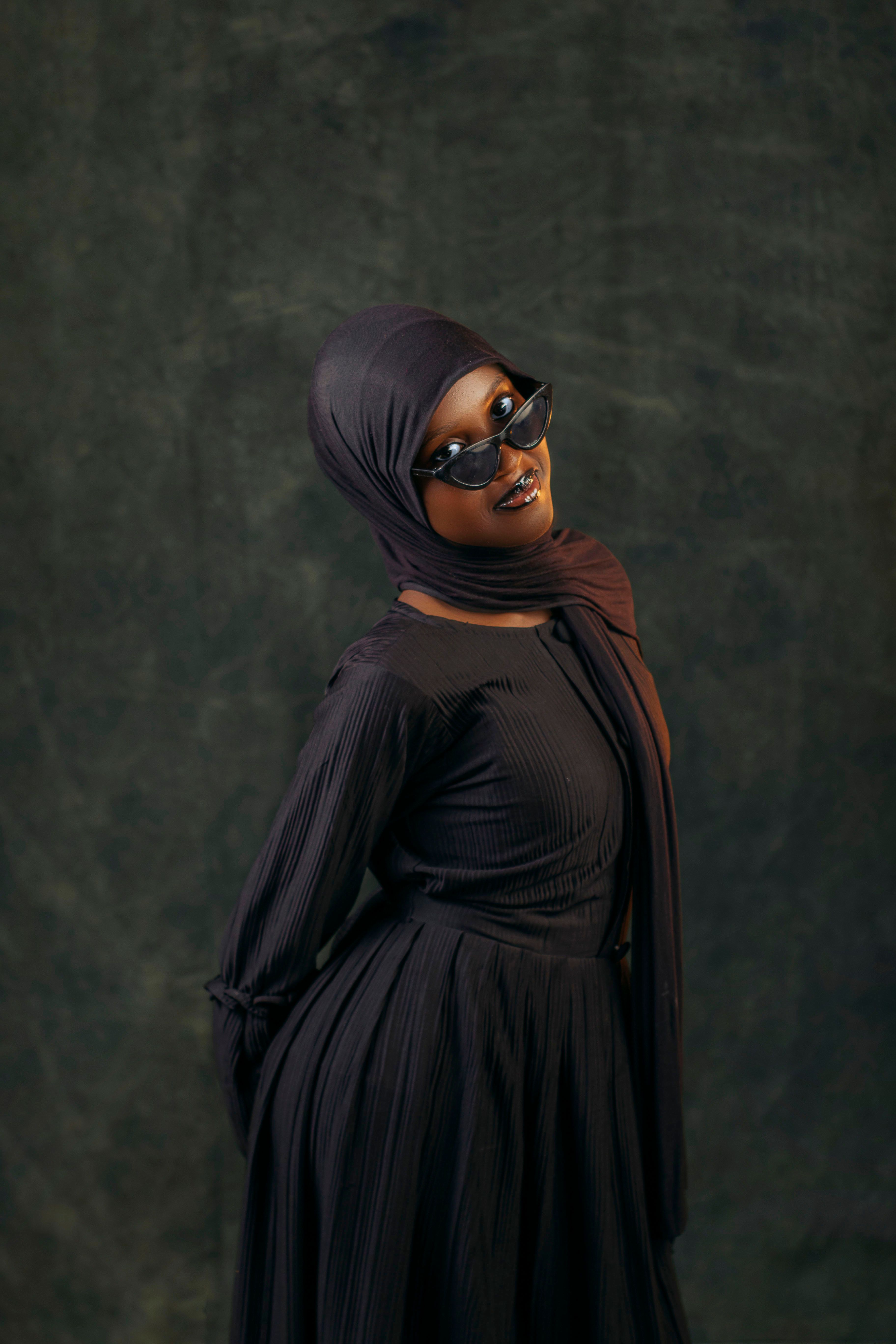 Stylish Portrait of a Woman in Hijab and Sunglasses · Free Stock Photo