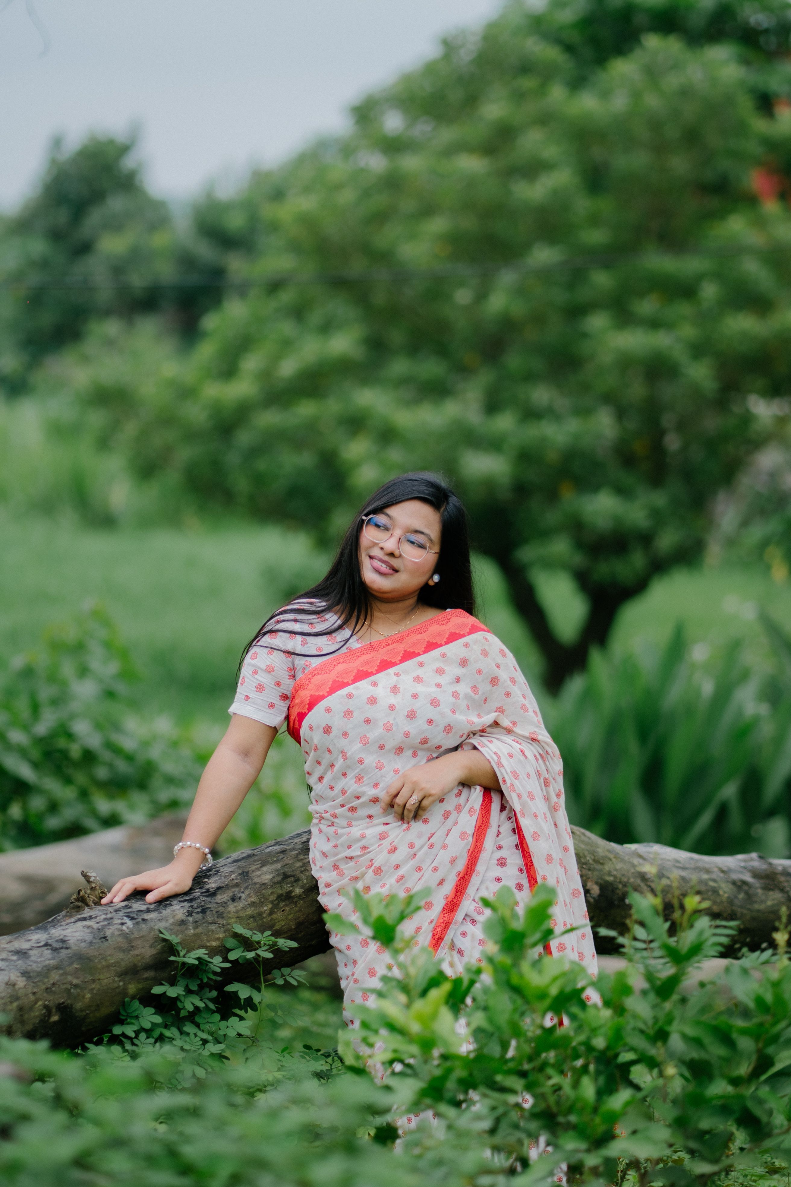Woman in Traditional Saree Posing Outdoors · Free Stock Photo