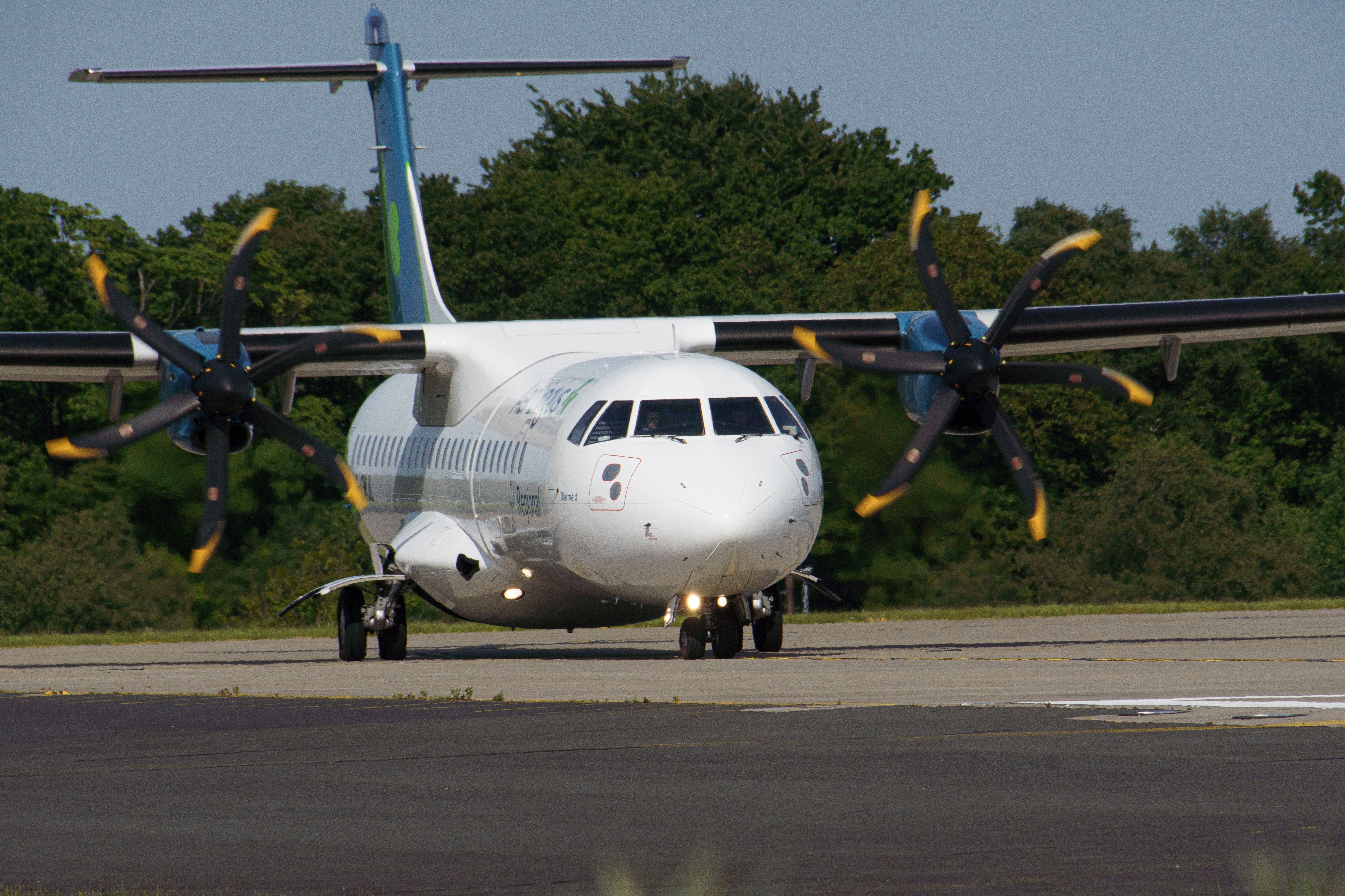 Turbo Propeller Plane on Airport Runway