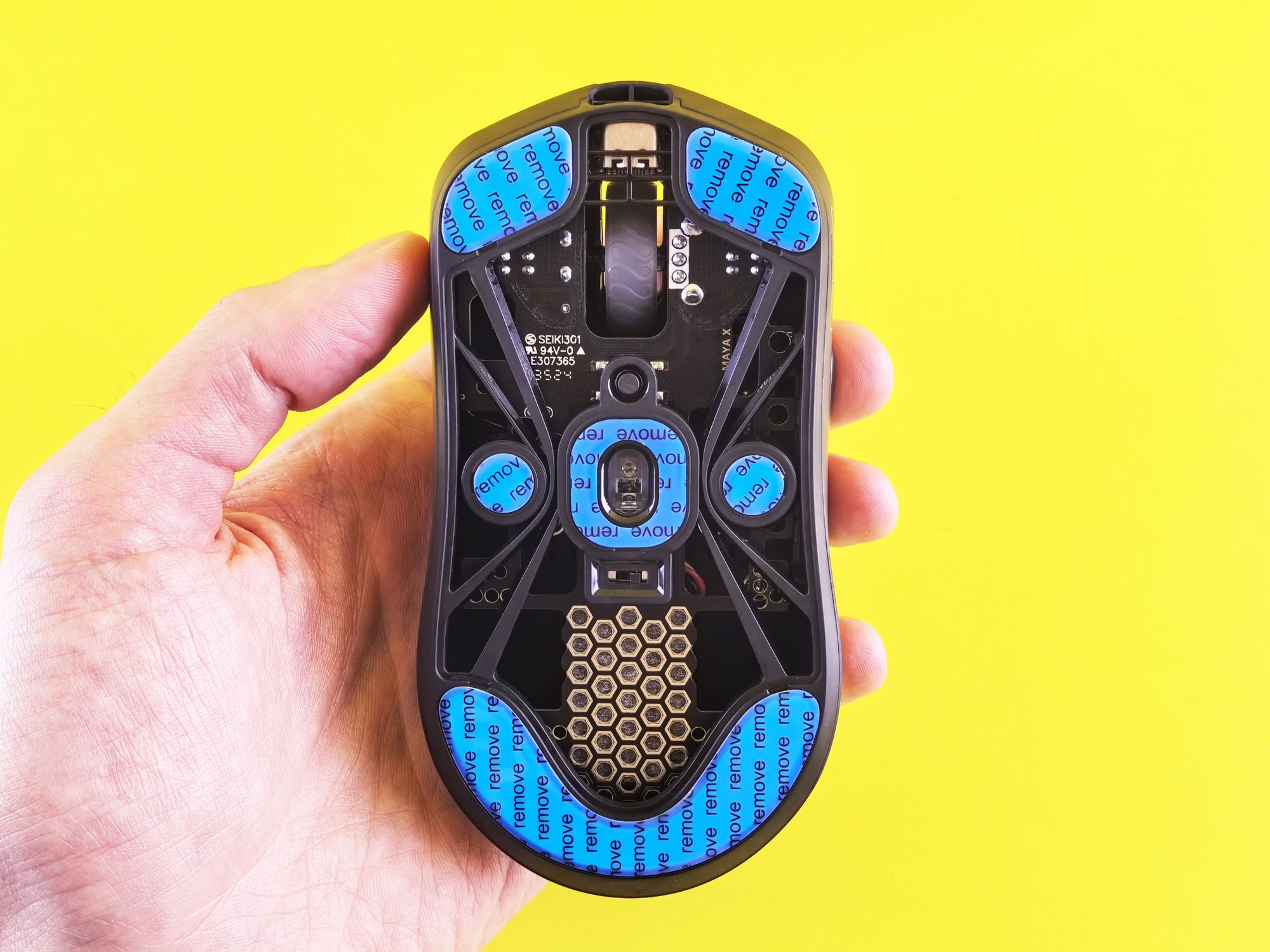 Gaming Mouse with Hexagonal Grip Design in Hand · Free Stock Photo