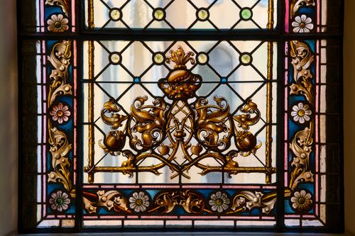 Free Detailed stained glass window with floral patterns in Zittau, Germany. Stock Photo