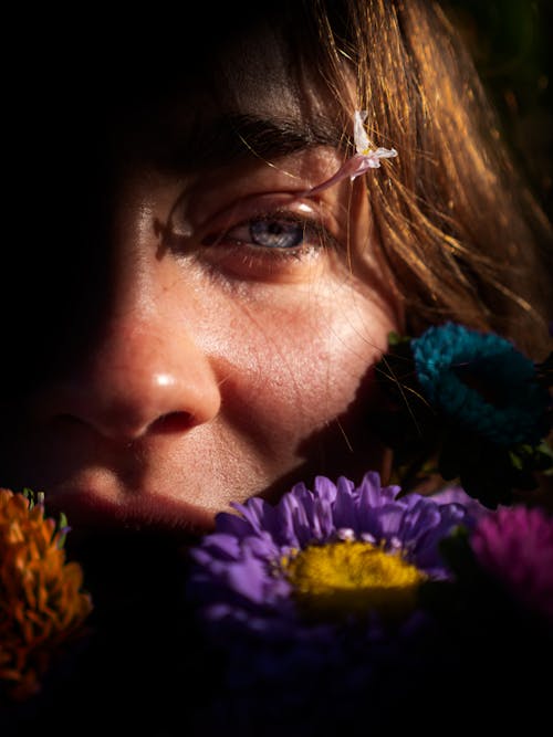 Free Flowers Near Woman's Face Stock Photo