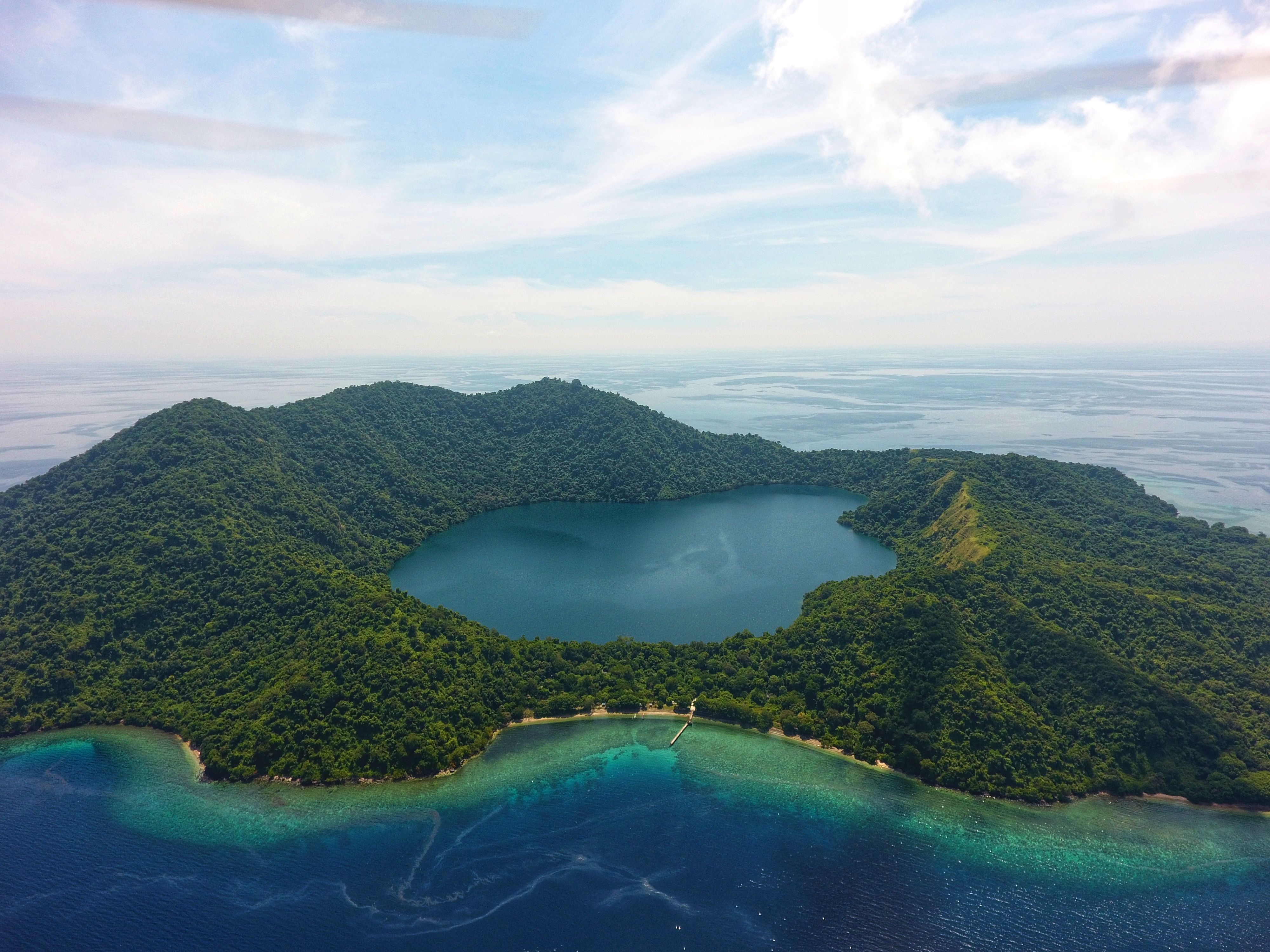 Stunning Aerial View of Volcanic Island Lake · Free Stock Photo