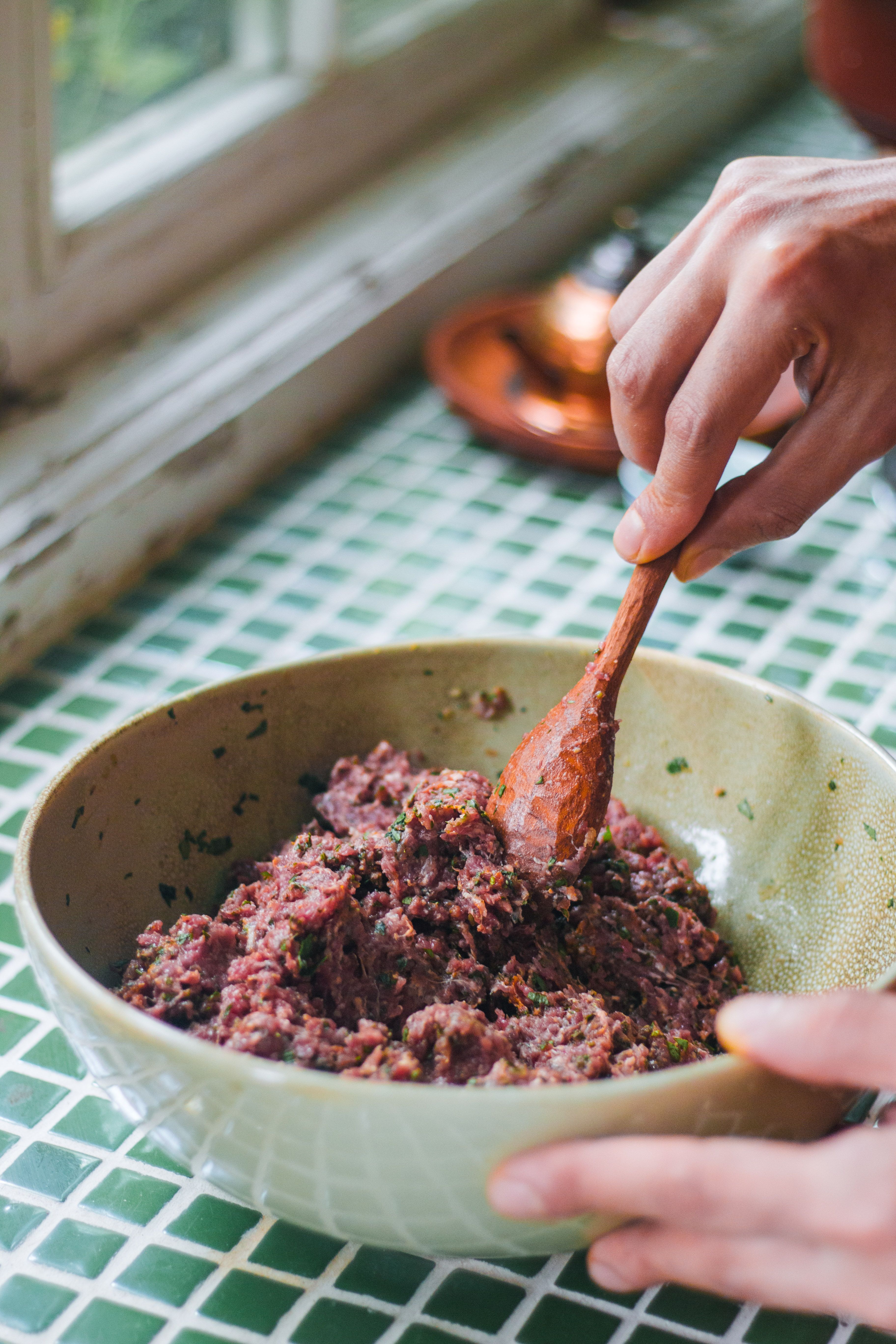 Preparing Fresh Minced Meat in Green Ceramic Bowl · Free Stock Photo