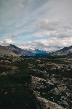 Experience the serene beauty of Jasper, Alberta with stunning mountain and sky views.