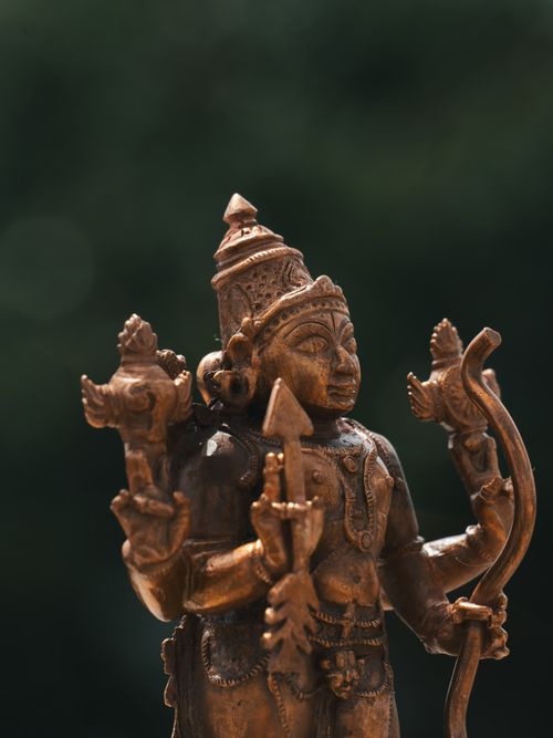 Free Close-up of a detailed brass Hindu deity statue showcasing artistry and cultural heritage. Stock Photo