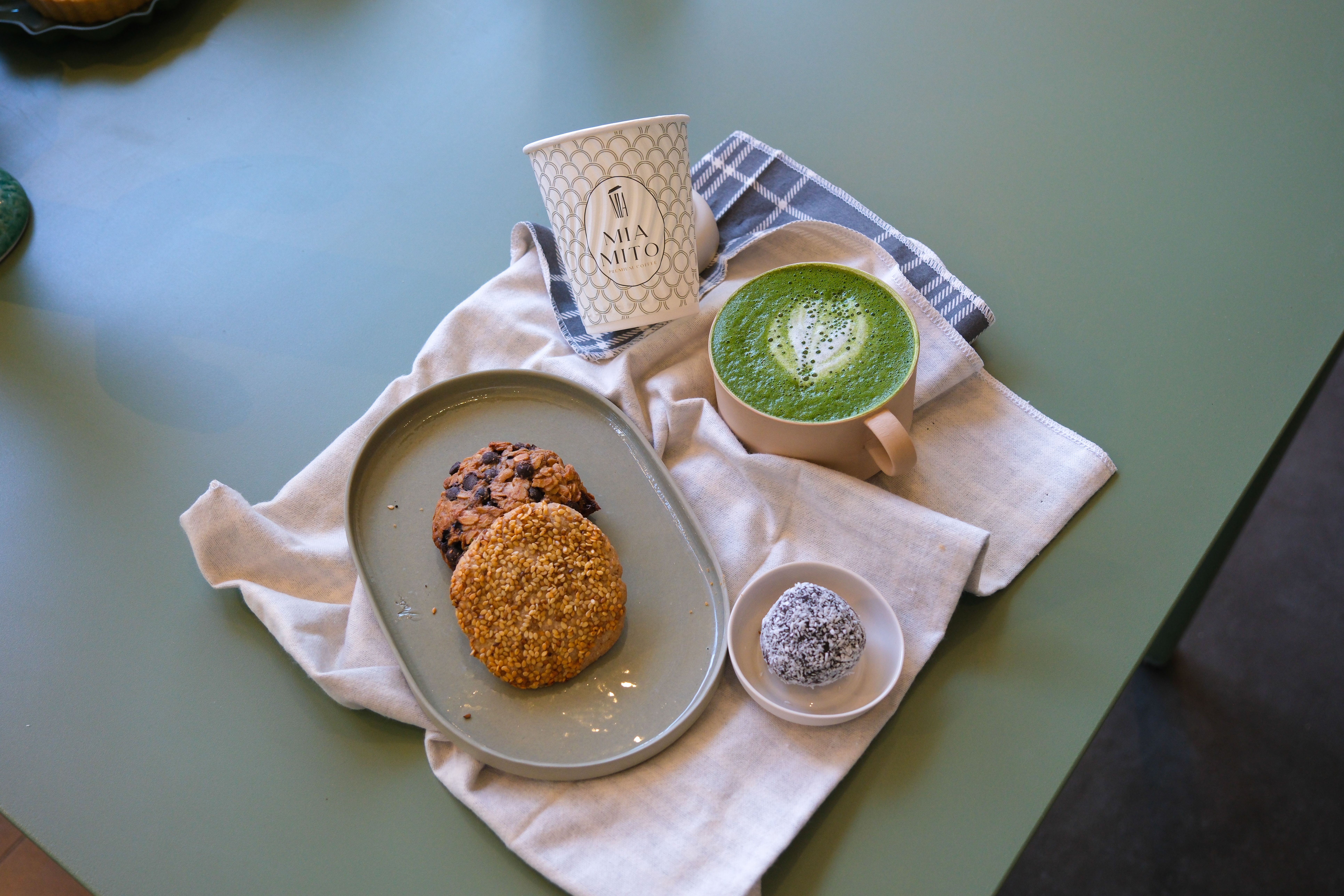 Karomi Cafe's vibrant ceremonial-grade matcha latte