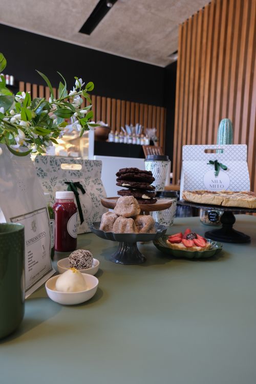 Free Delicious assortment of pastries and desserts elegantly displayed in a modern Ankara cafe setting. Stock Photo