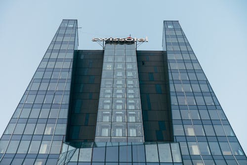 Glass Panel Hotel Building Under Blue Sky