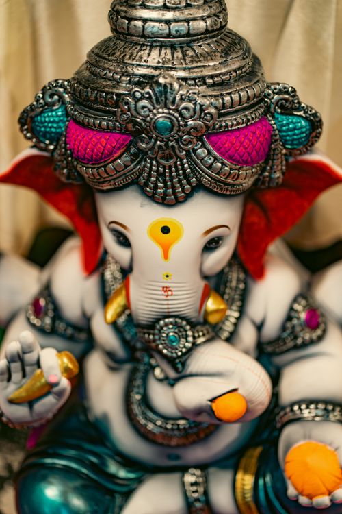Free Vibrant Ganesh statue with intricate designs and colorful ornaments, perfect for cultural symbolism. Stock Photo