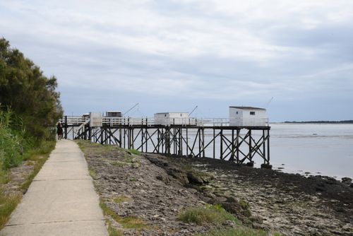 Free Scenic view of traditional fishing huts on stilts along the coast in Fouras, Nouvelle-Aquitaine, France. Stock Photo