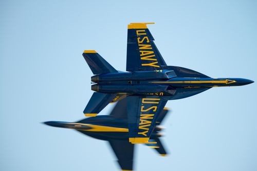 Free Dynamic shot of Blue Angels F/A-18 jets performing at an air show in Fairfield, California. Stock Photo