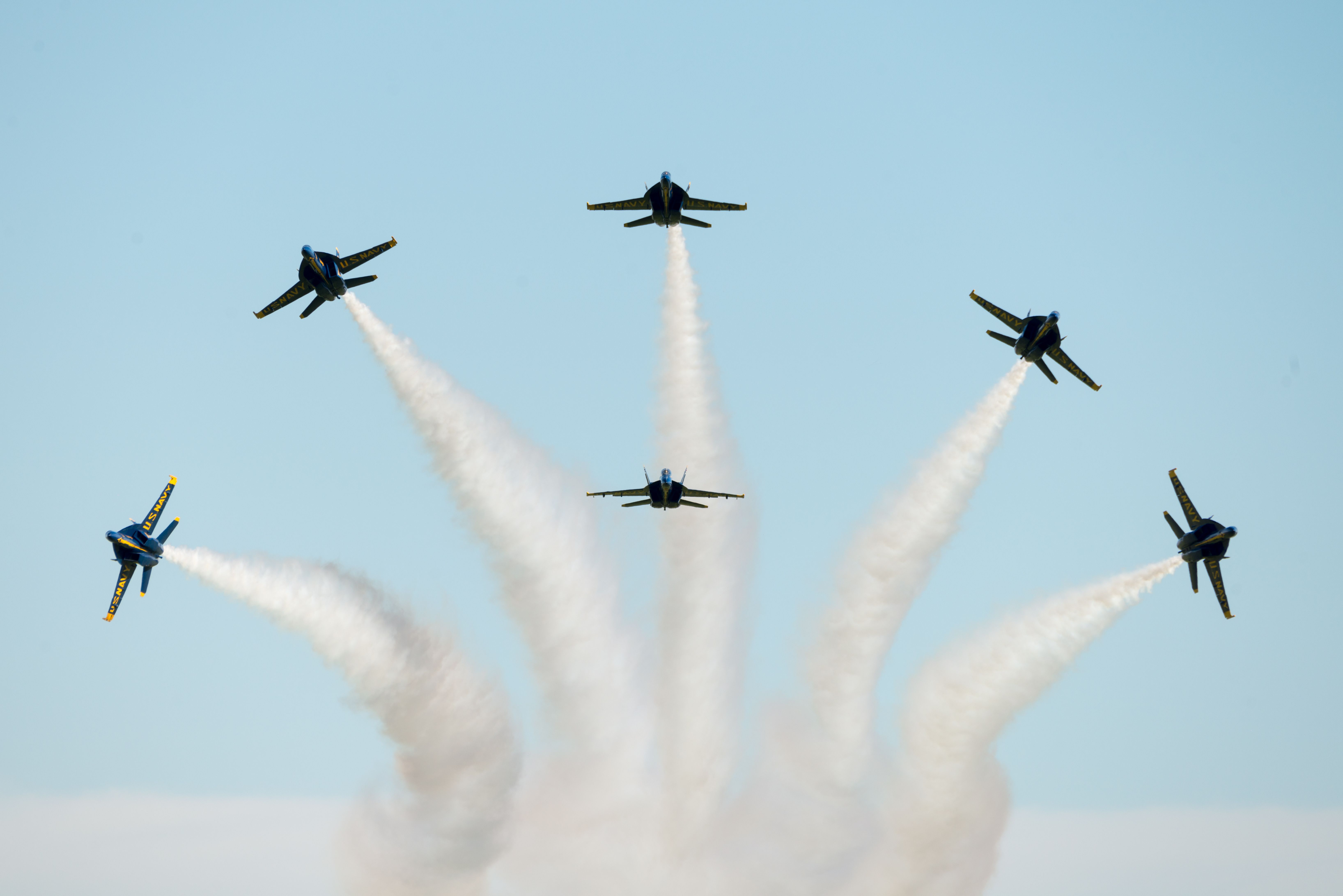 The Blue Angels showcase a breathtaking aerial maneuver during an air show in Fairfield, California.