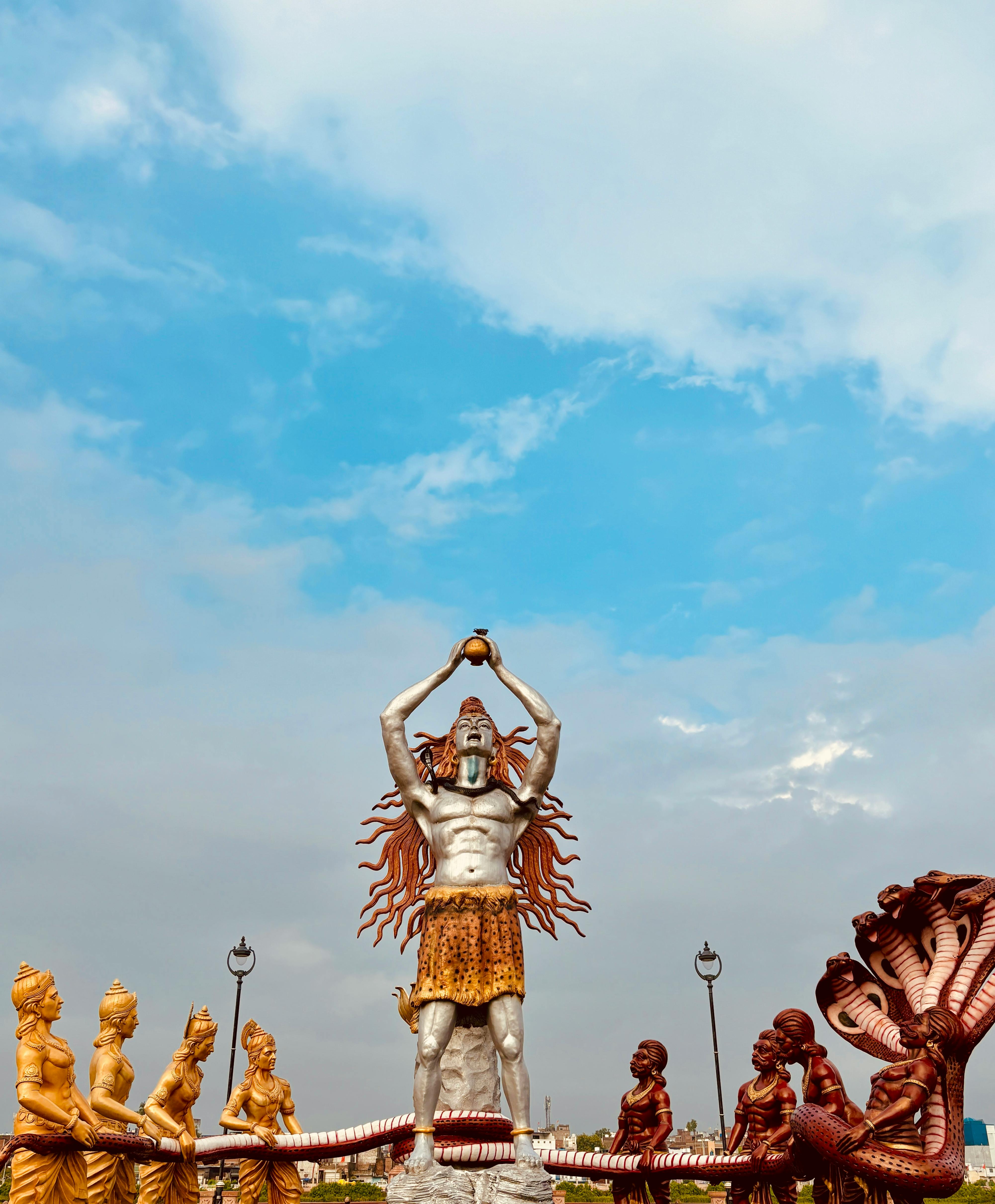 Statue depicting Samudra Manthan with Hindu deities in Ujjain, India.
