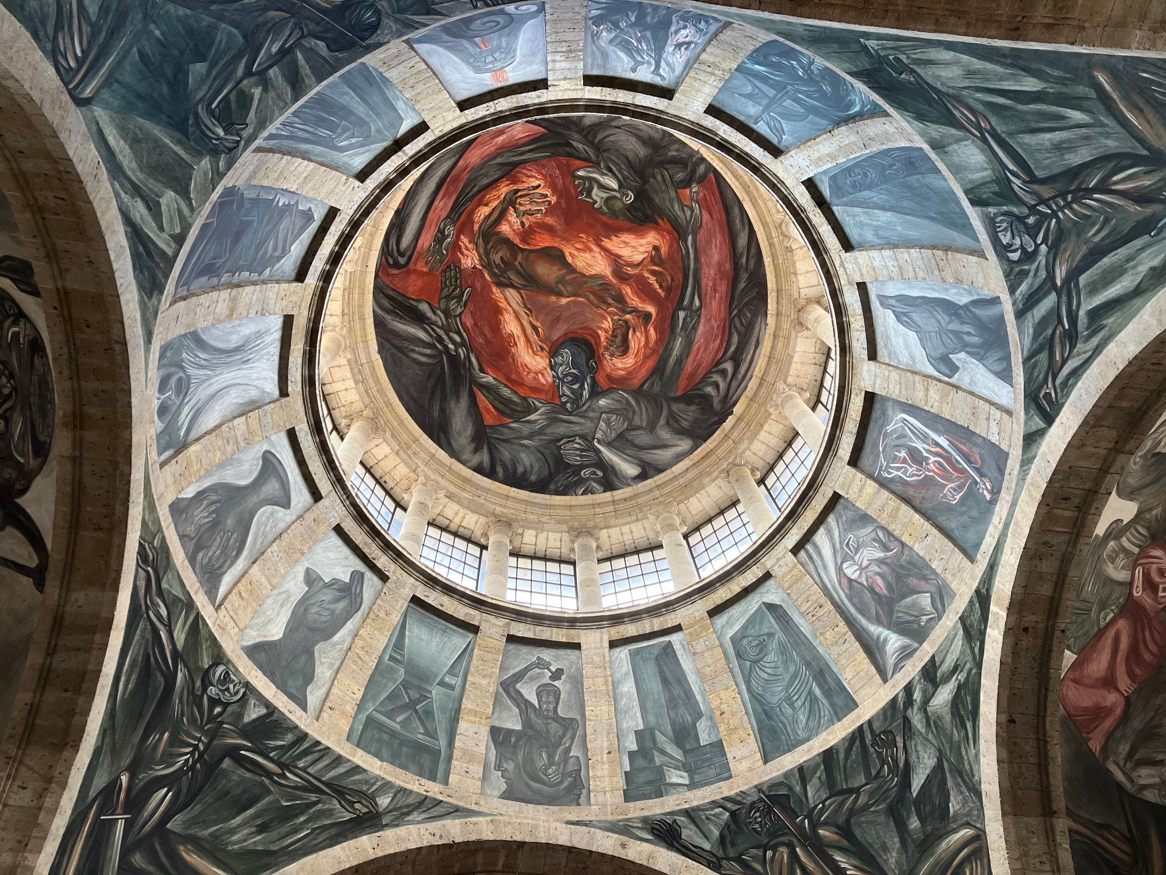 Stunning ceiling murals in Hospicio Cabañas, Guadalajara, showcasing dramatic Mexican art.