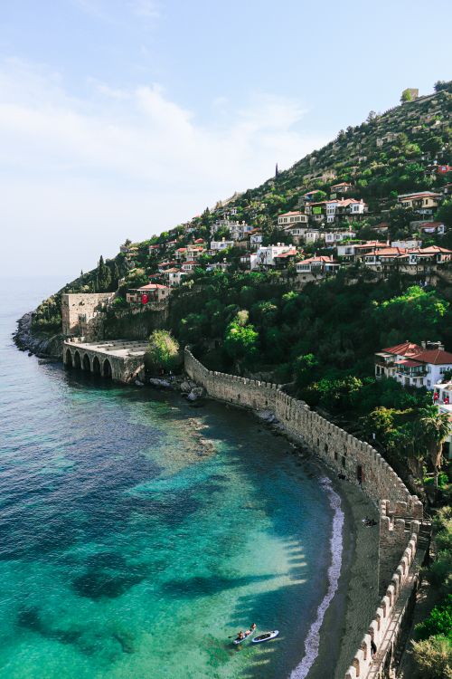 Free Majestic aerial view of Alanya Castle and turquoise coastline, showcasing scenic beauty. Stock Photo